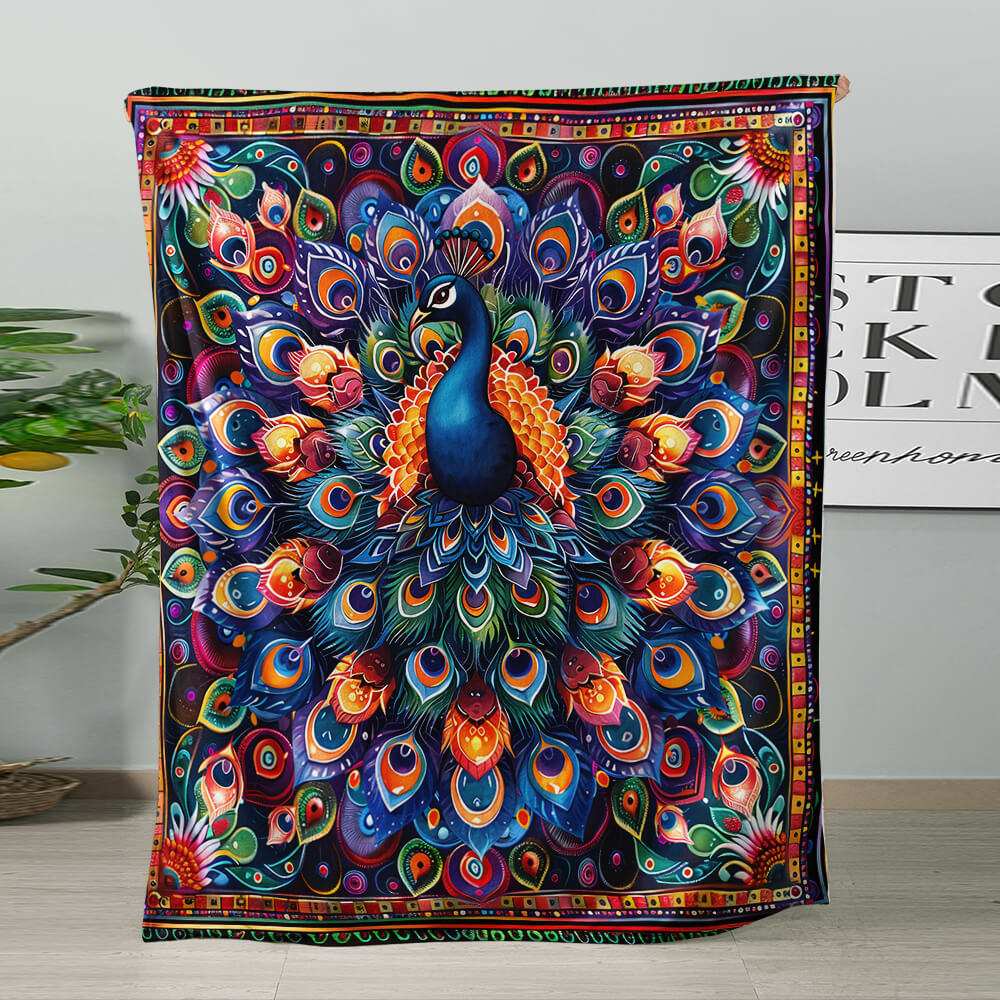 A colorful tapestry featuring a vibrant peacock with an elaborate, symmetrical tail of feathers in shades of blue, purple, green, orange, and red, hanging against a light gray wall.
