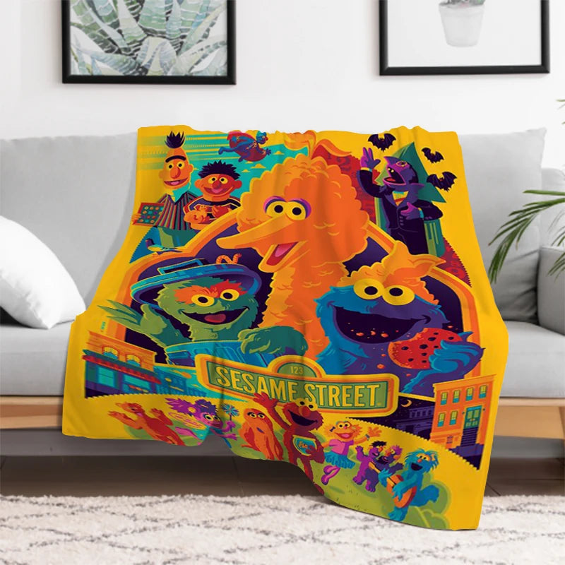 Close-up of Cookie Monster and Elmo design on Sesame Street blanket