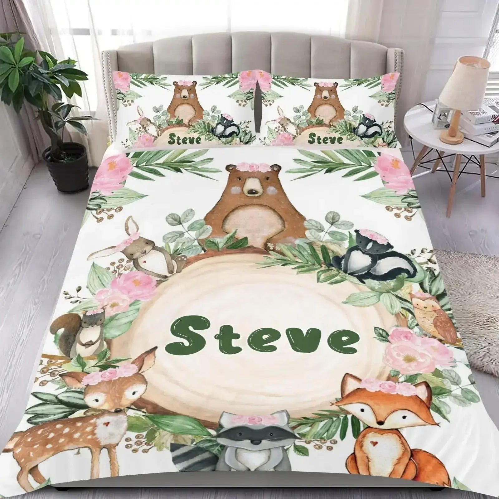 Bedding set featuring cartoon animals and personalized text, displayed on a neatly arranged bed