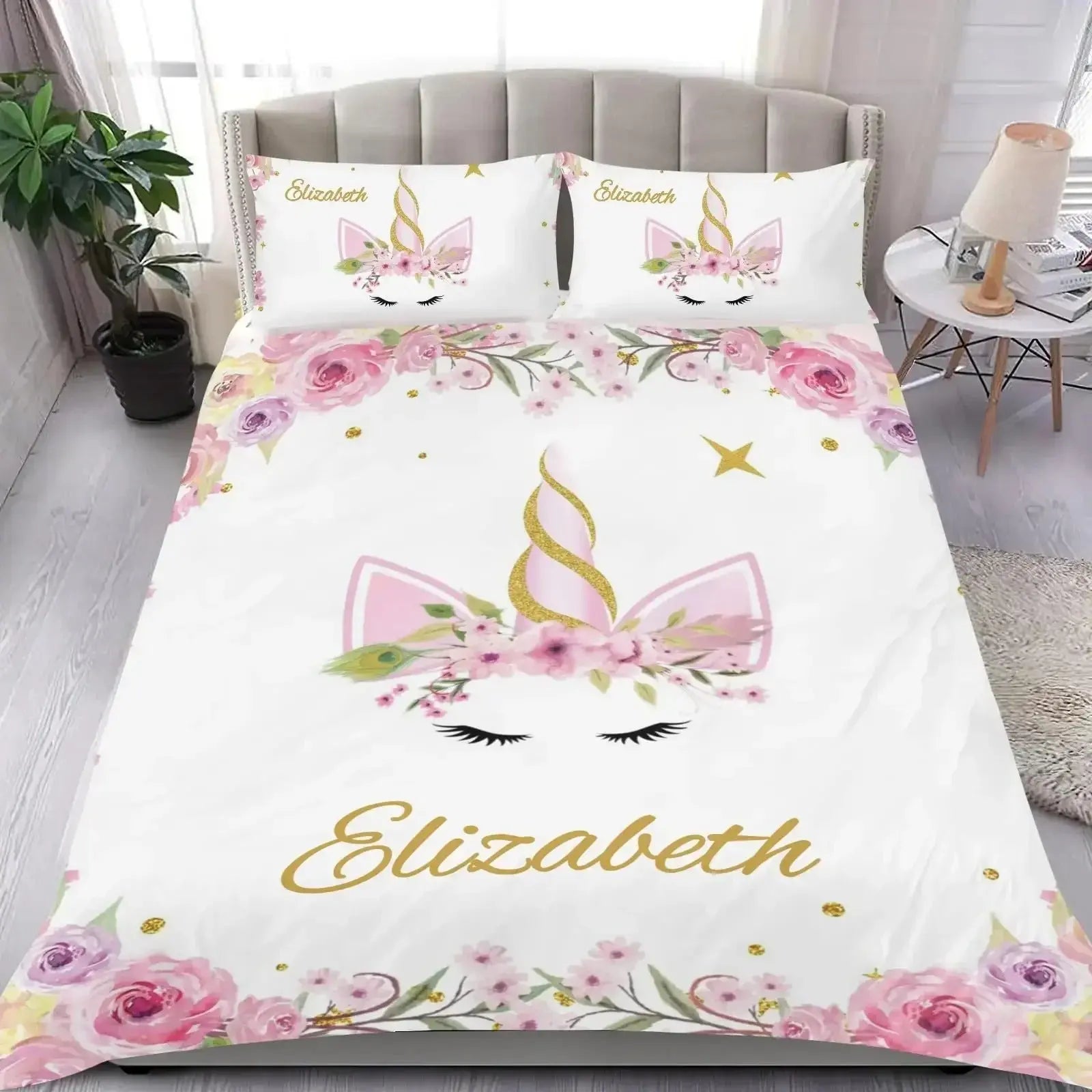 Beautiful floral unicorn bedding set with personalized name text on a cozy bed in a stylish bedroom, featuring soft duvet cover and pillowcases, perfect for enhancing bedroom decor and comfort.