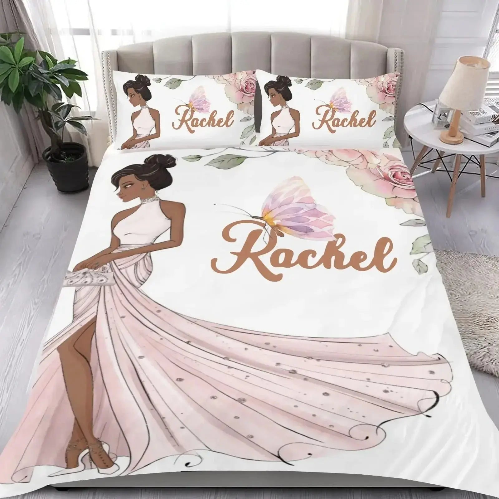 Elegant bedding set featuring a woman in a gown with floral elements and ‘Name’ design, displayed on a bed in a stylish bedroom setting.