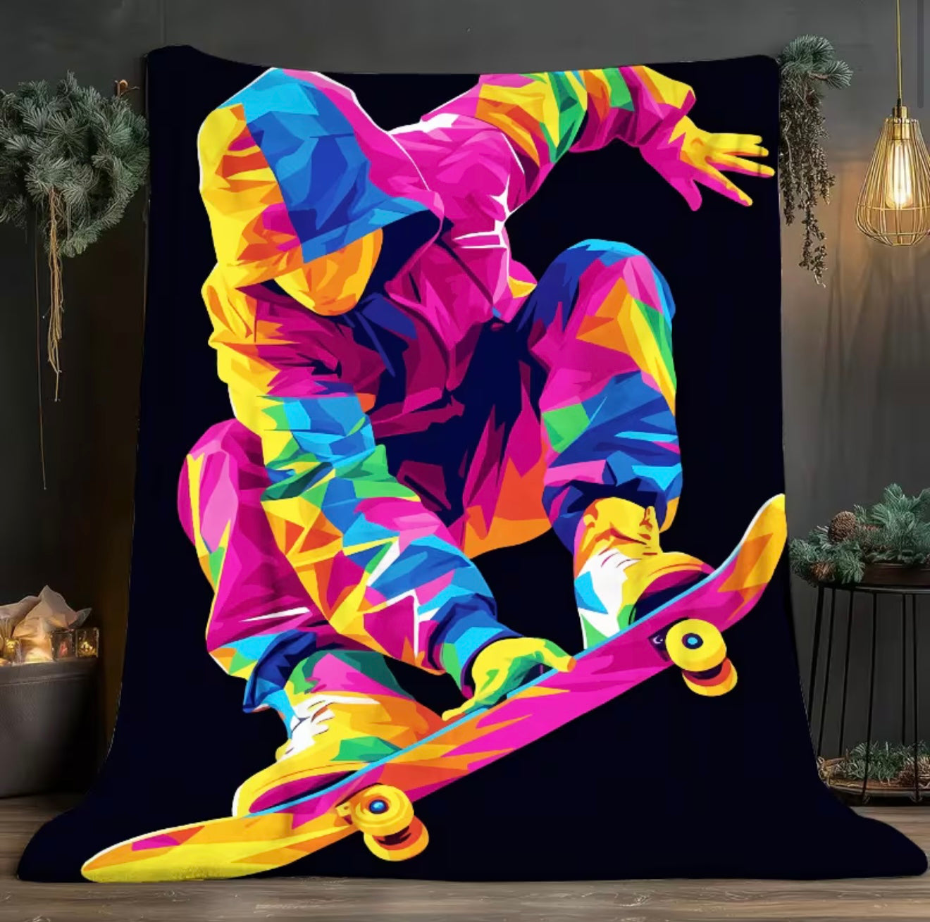 Colorful skateboarder design on a black blanket in a room setting.