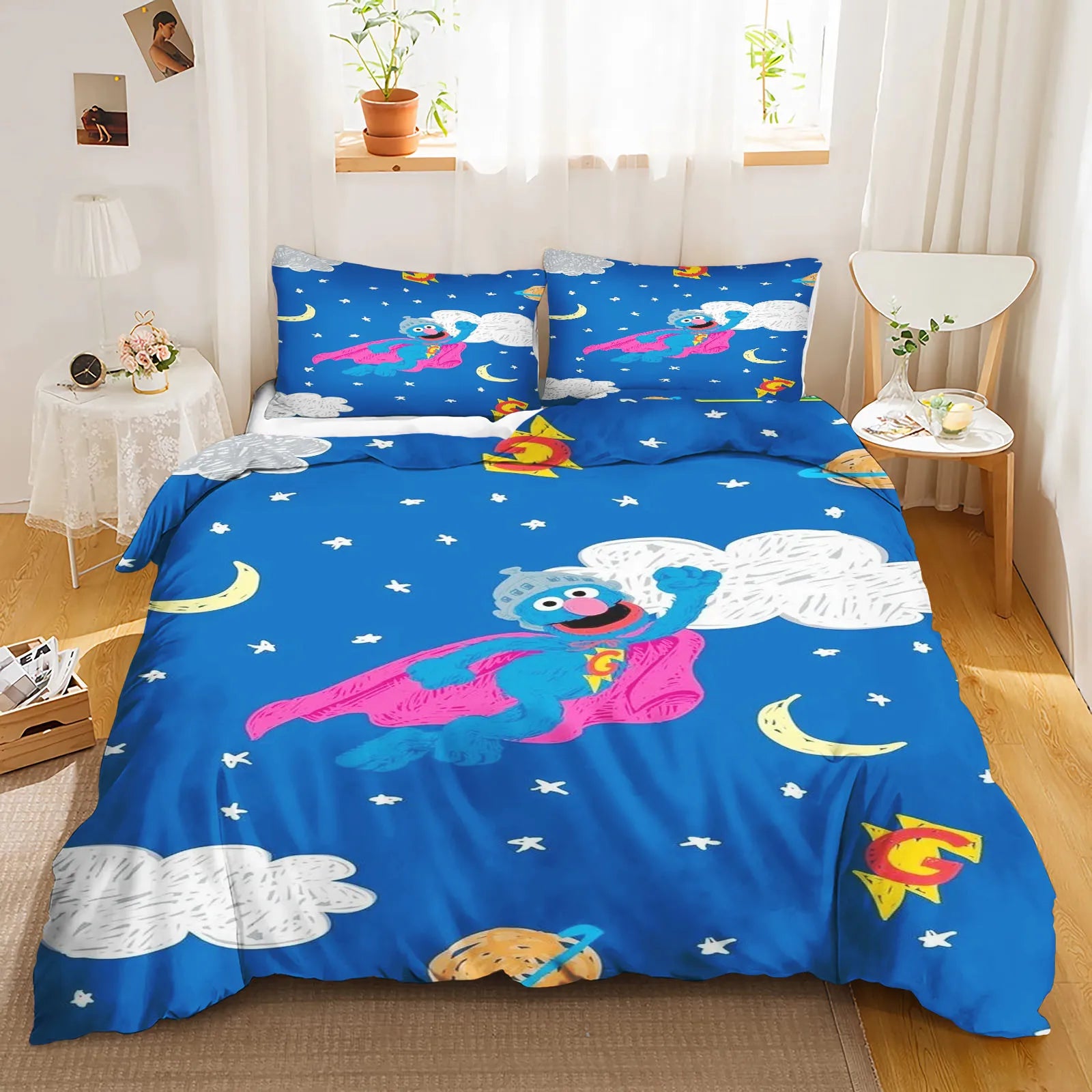 Matching pillowcase showing Cookie Monster and Elmo back-to-back with cheerful expressions.