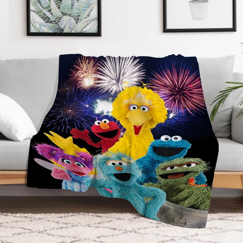 Sesame Street blanket on a couch for movie night