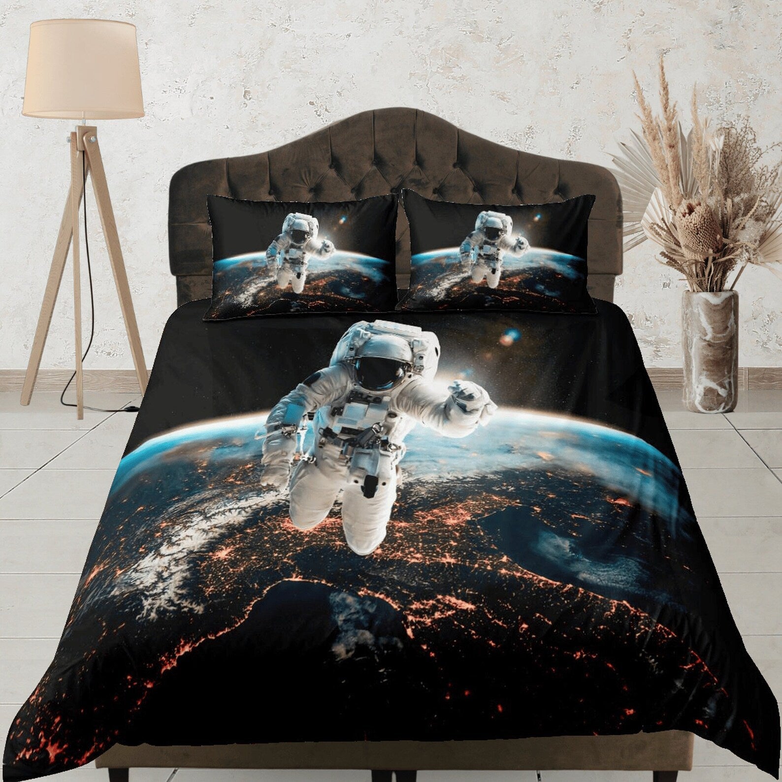 Colorful astronaut bedding for a kids bedroom