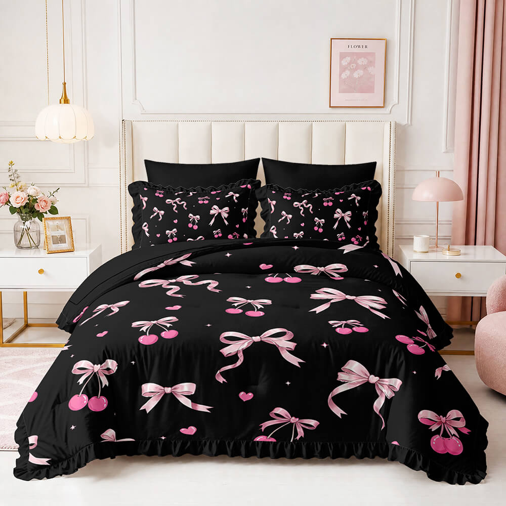 A black bedding set with a pink cherry and bow pattern, styled on a bed in a bright, modern bedroom with pink accents.