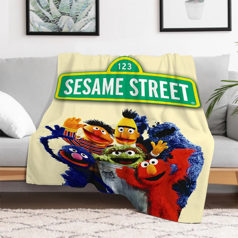 Child playing on Sesame Street rug with Cookie Monster and Elmo