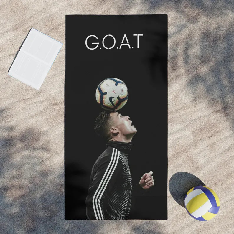 Close-up of CR7 towel fabric, highlighting soft texture and high-quality stitched Ronaldo logo.