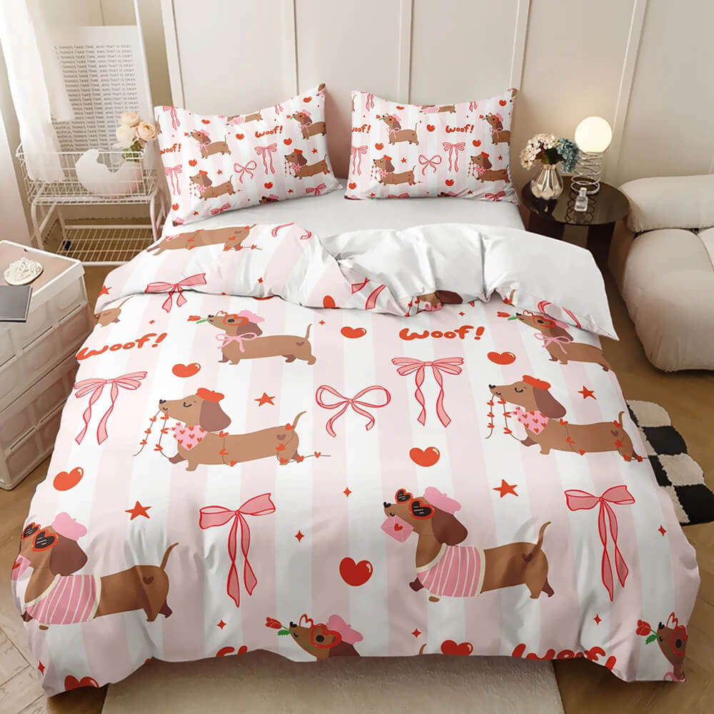 Colorful kids bedding printed with cartoon dachshunds wearing pink bows and hearts, plus scattered pink bows and red hearts.