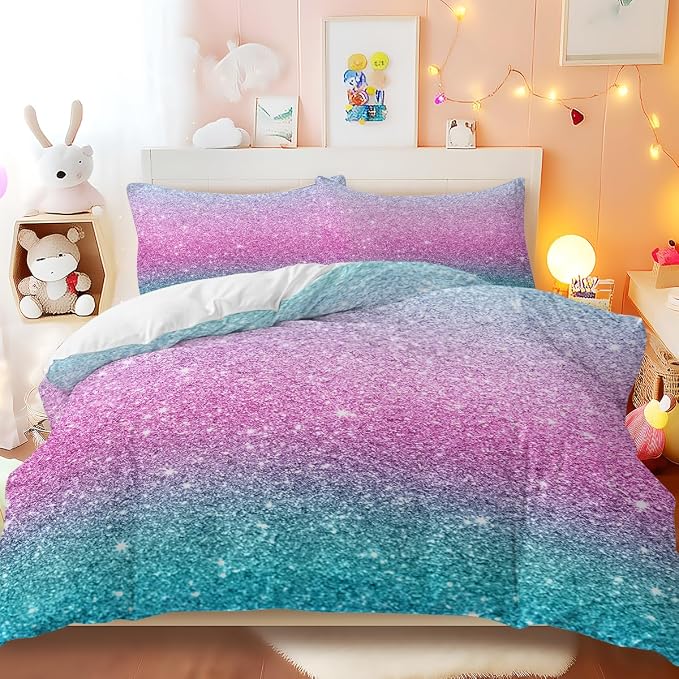 A pastel gradient bedding set with a glittery texture, featuring a pink-to-blue transition, styled on a bed in a cozy, decorated bedroom.
