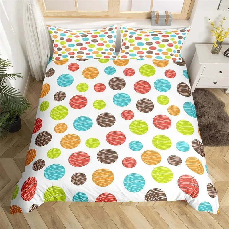 Colorful polka dot bedding on king bed