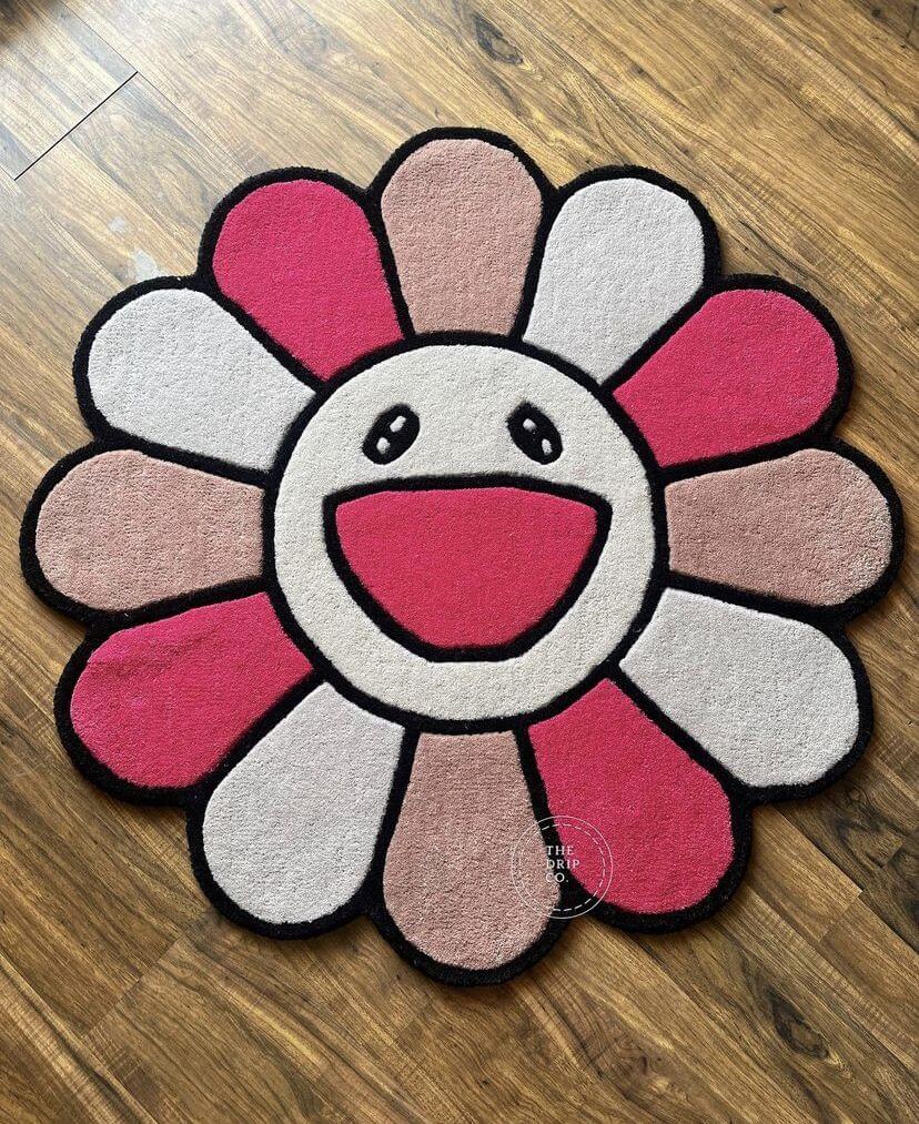 Colorful tufted flower rug with smiling face