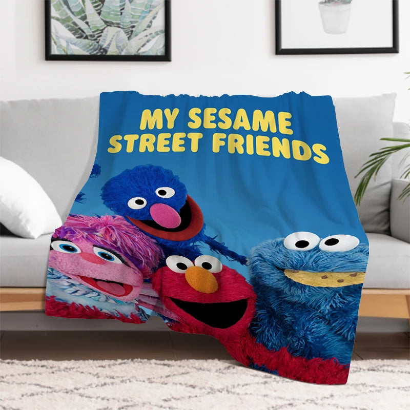 Cozy kids bedroom featuring Sesame Street blanket with Elmo and Cookie Monster
