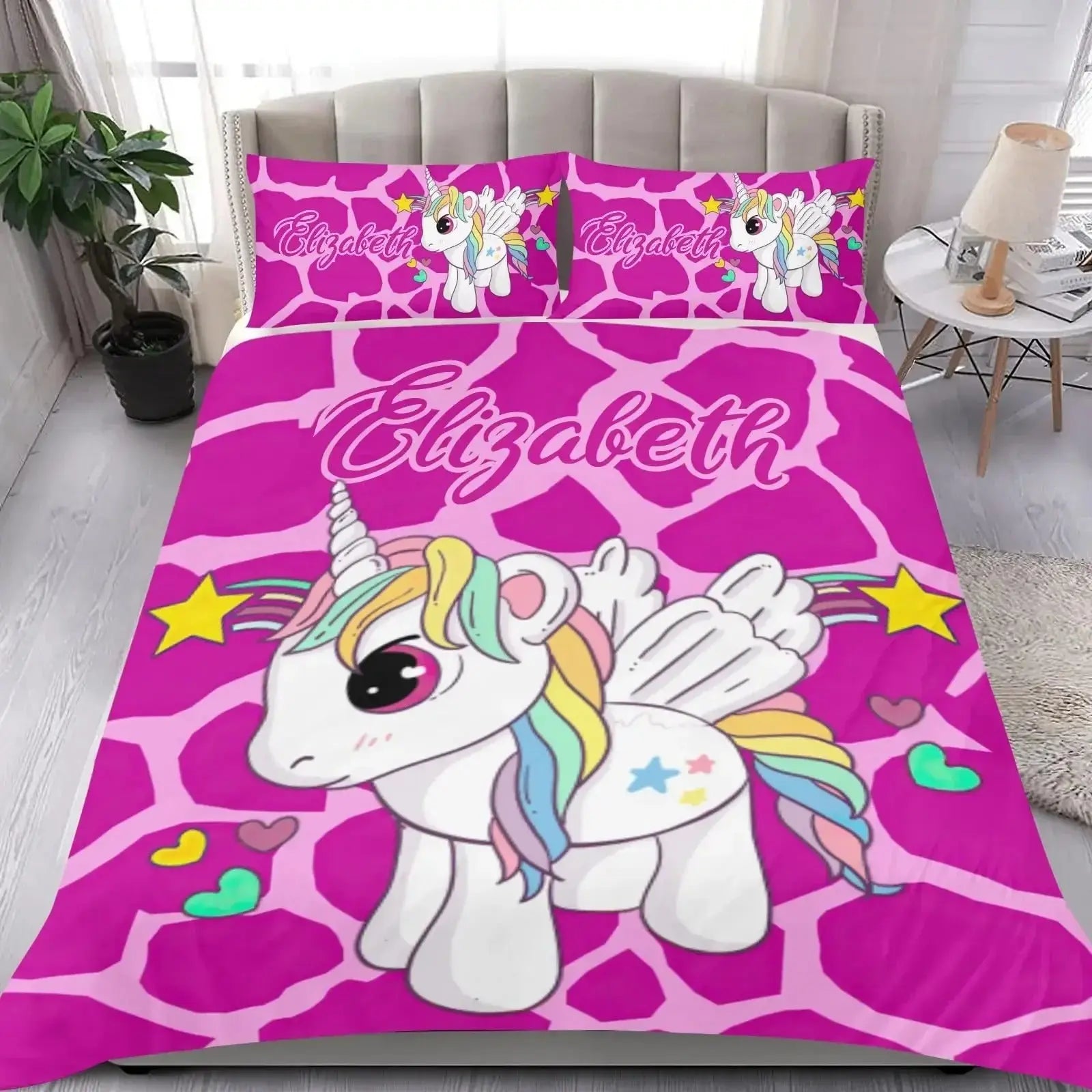 Unicorn-themed custom name bedding set with 'Elizabeth' on a pink background in a cozy room setting