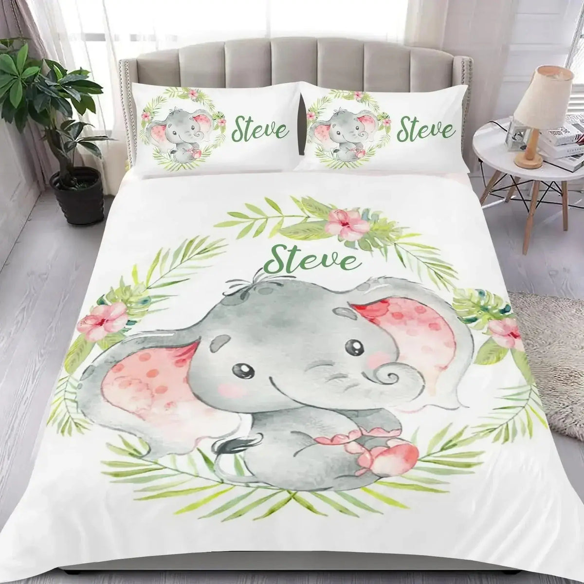 Bedding set featuring elephant design and text on a bed in a cozy bedroom setting