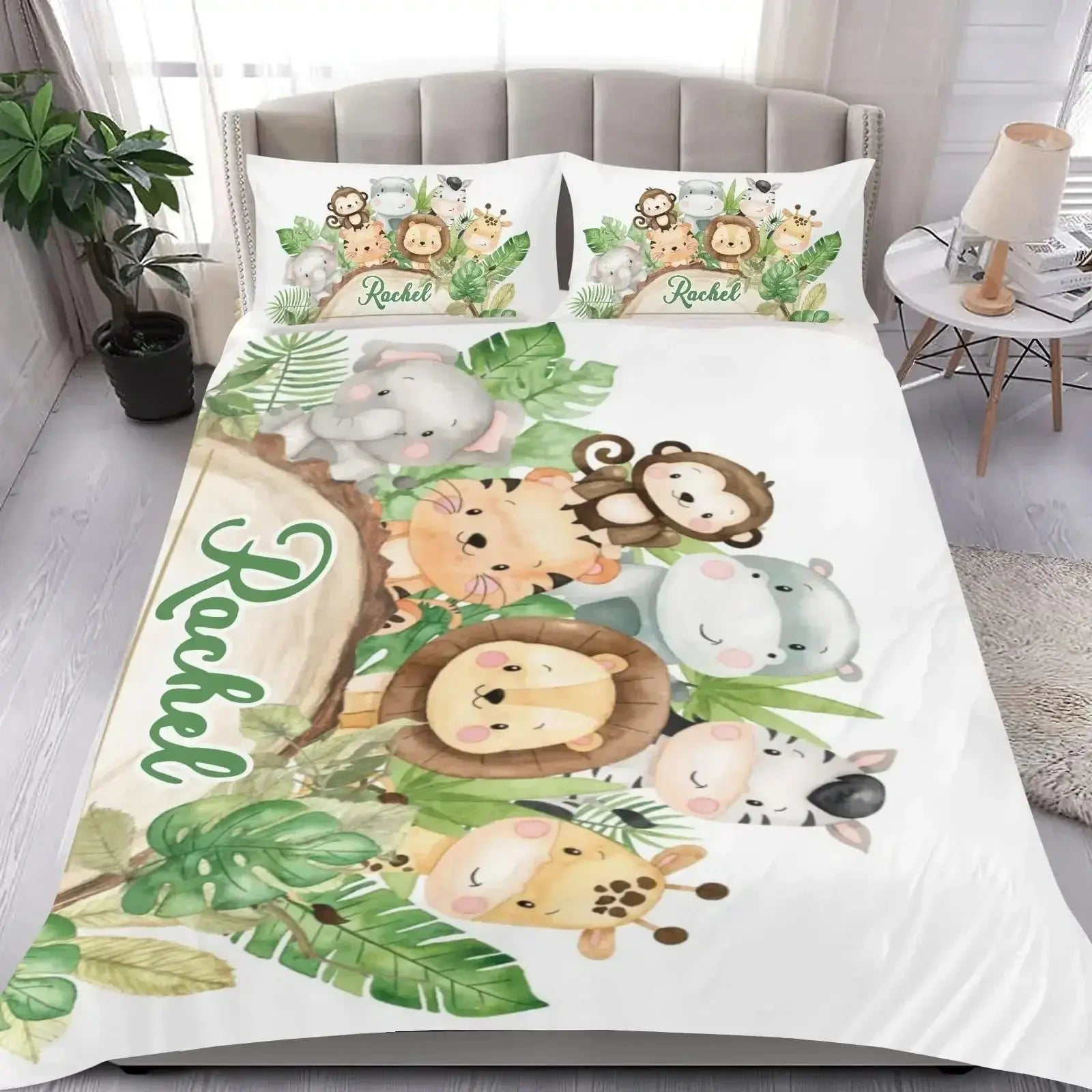 Children’s bedding set featuring animal design and ‘Name’ printed on it, placed on a bed in a cozy kids’ bedroom