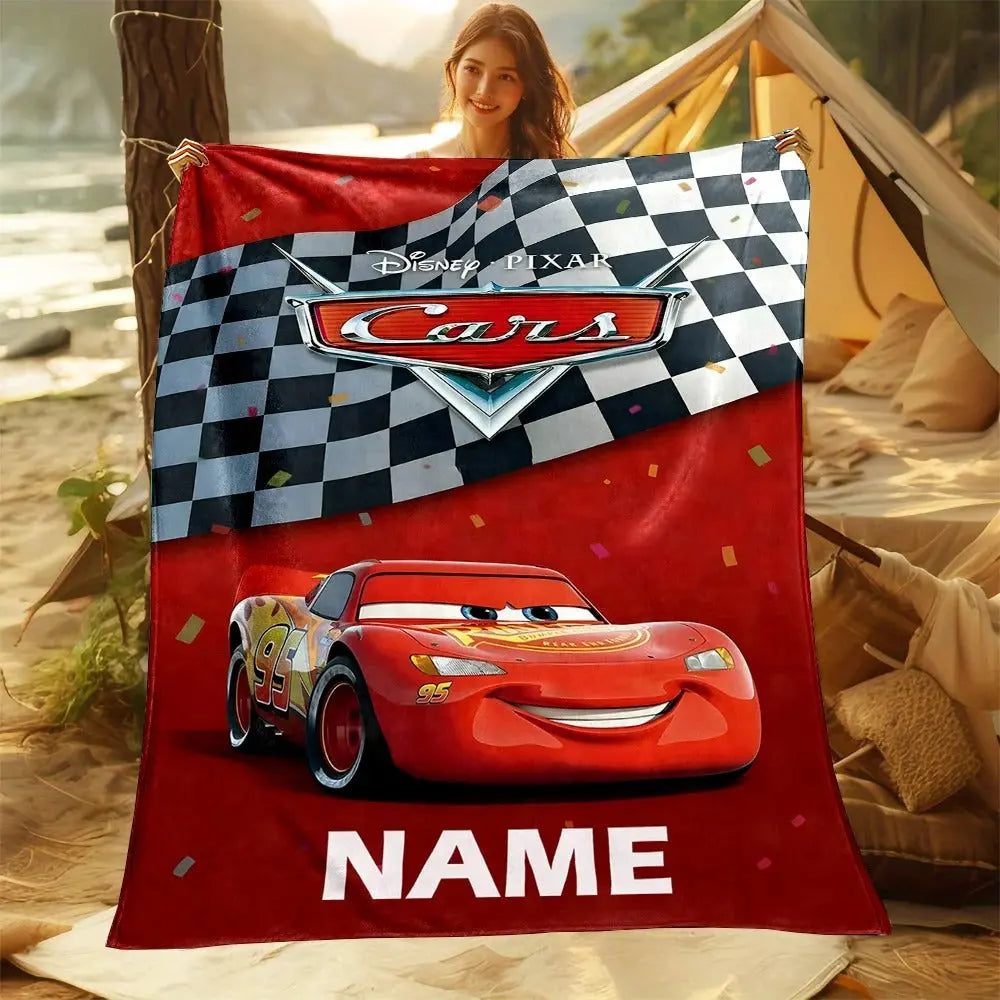 Bed blanket featuring Lightning McQueen with a boy’s name customized, shown on a twin-size bed