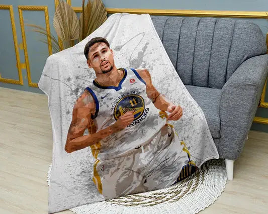 Klay Thompson splash effect flannel blanket featuring vibrant NBA basketball player design, ultra-soft warm fabric, and dynamic sports graphics perfect for fans’ bedding or sofa throw