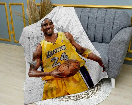 Kobe Bryant splash effect flannel blanket featuring bold NBA player artwork, ultra-soft warm fabric, and dynamic Lakers-themed design perfect for basketball fans’ bedding or sofa throw