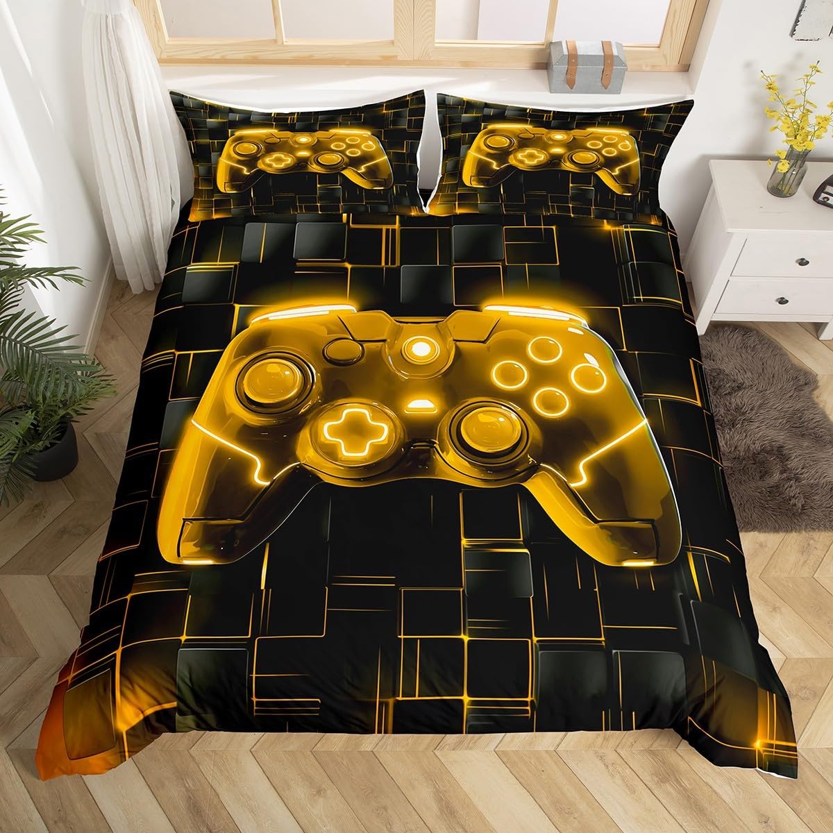 A bedding set featuring a duvet cover and two pillowcases with a glossy gold video game controller graphic on a black geometric background, shown on a bed in a styled bedroom setting.
