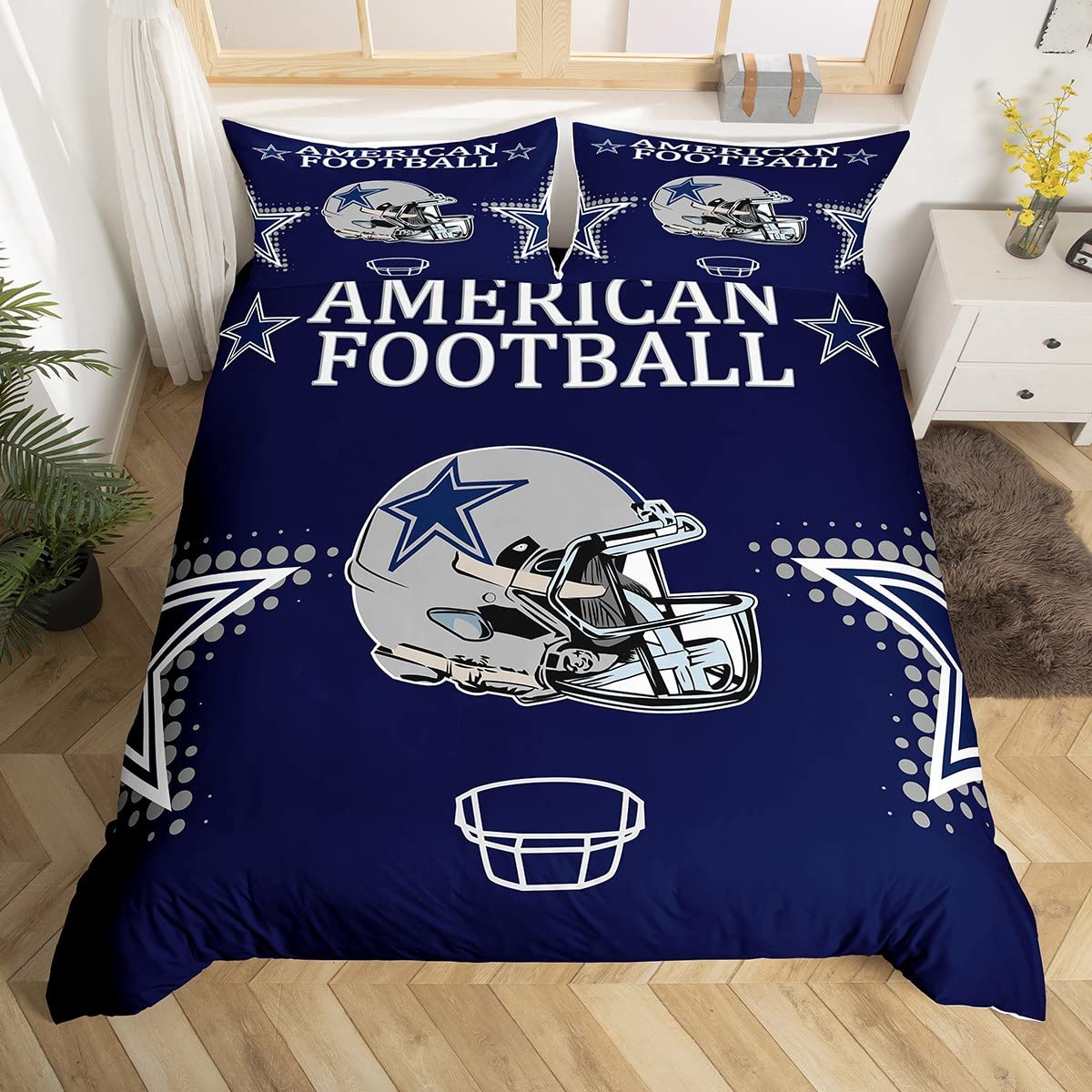 A navy blue bedding set featuring a Dallas Cowboys-themed 'American Football' design, including a helmet graphic, stars, and text, displayed on a bed in a bedroom setting.