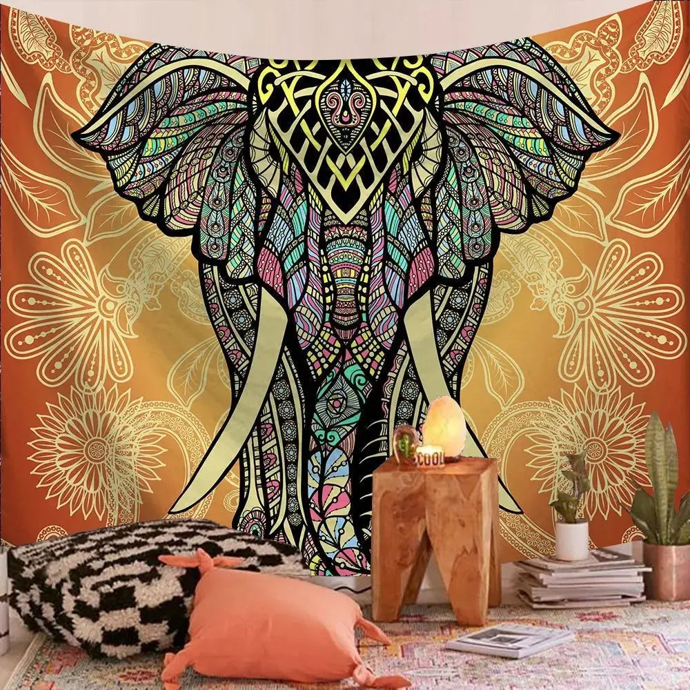 Indian mandala tapestry draped over a grey sofa in a cozy living room