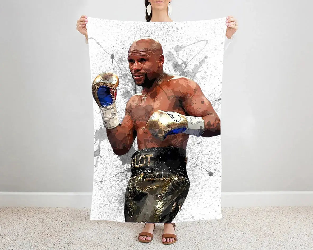 Floyd Mayweather knockout splash effect flannel blanket featuring bold boxing champion graphics, ultra-soft warm fabric, and dynamic design perfect for boxing fans’ bedding or sofa throw