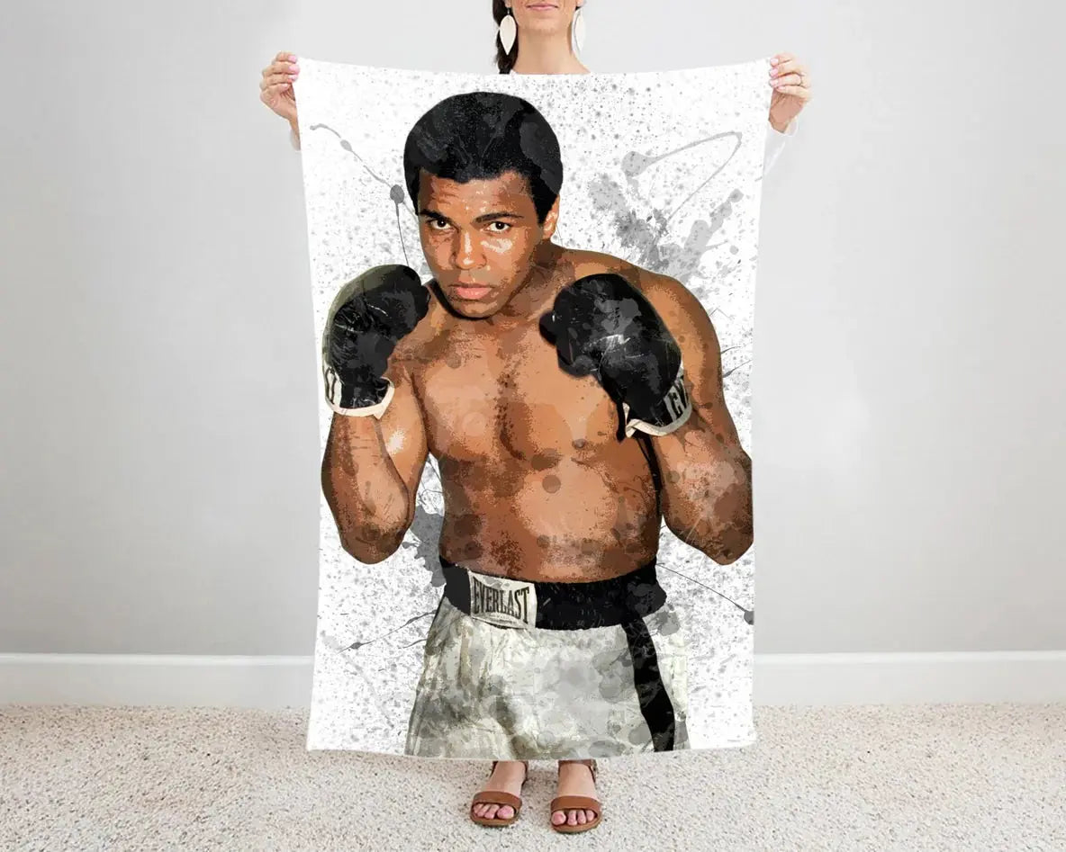 Muhammad Ali splash effect flannel blanket featuring iconic boxing legend graphics, ultra-soft warm fabric, and bold design perfect for boxing fans’ bedding or sofa throw