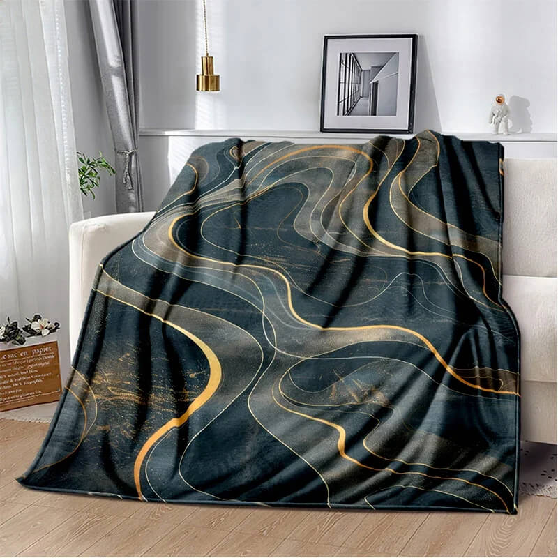 Decorative gold marble blanket on sofa edge
