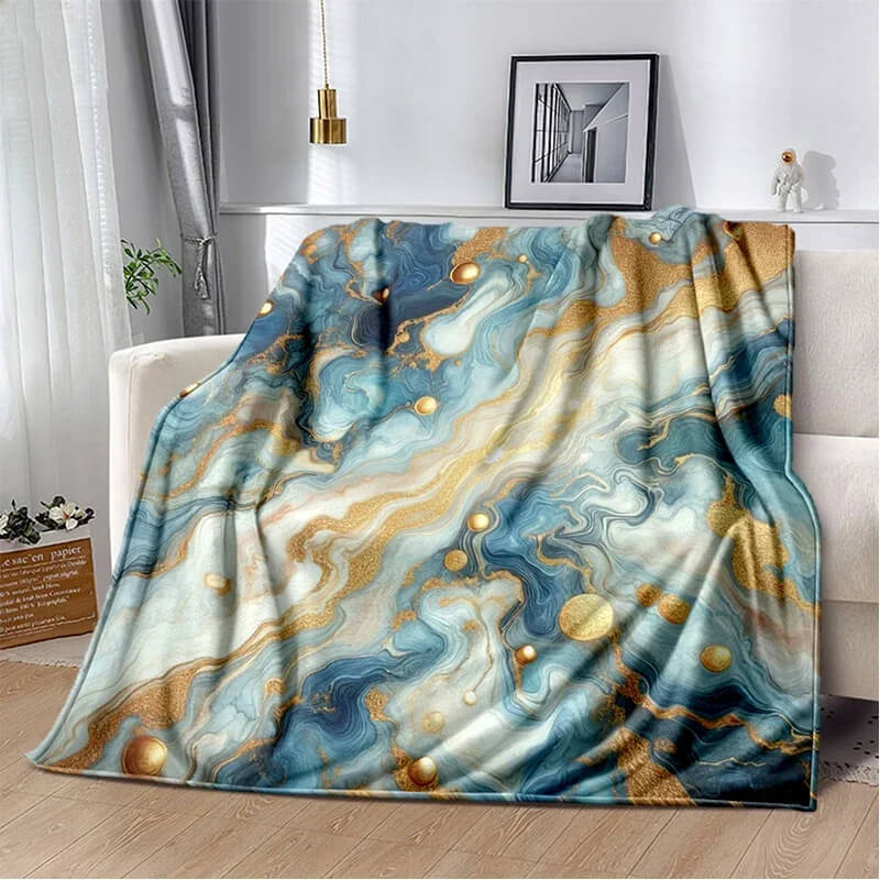 Gold marble print blanket close-up texture