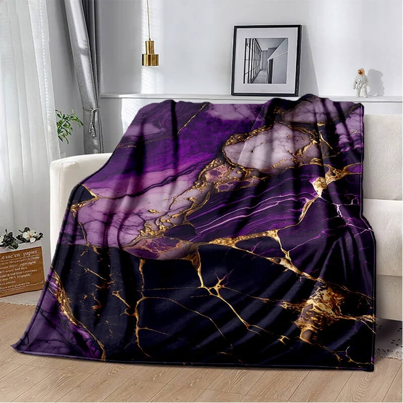 Gold marble abstract blanket on couch