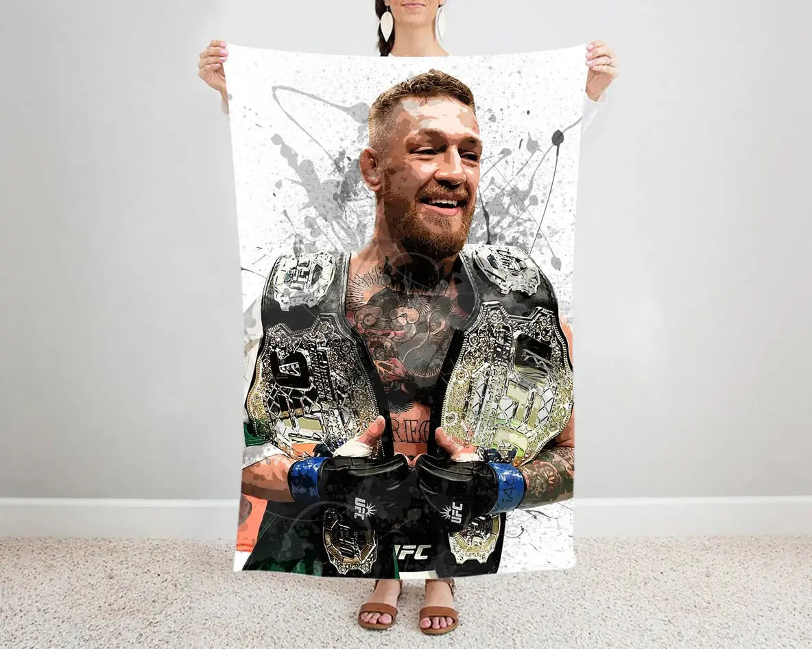 Conor McGregor splash effect flannel blanket with bold UFC fighter design, ultra-soft warm fabric, and eye-catching martial arts graphics perfect for MMA fan bedding or sofa throw