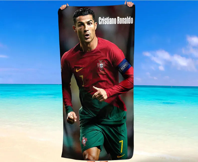 Man using Cristiano Ronaldo towel at the gym, wiping sweat after workout with CR7 branding visible.