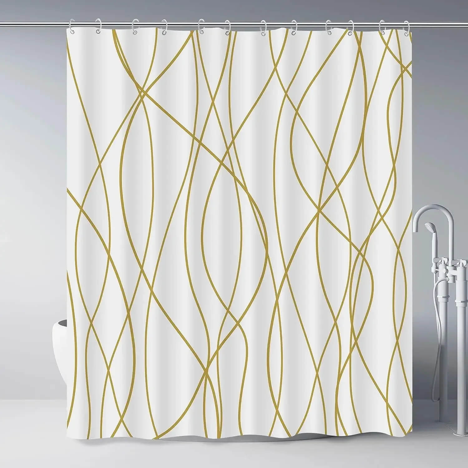 A white shower curtain with a modern abstract pattern of intersecting wavy lines in a muted mustard-gold color, hanging from silver rings on a metal rod in a bathroom setting.
