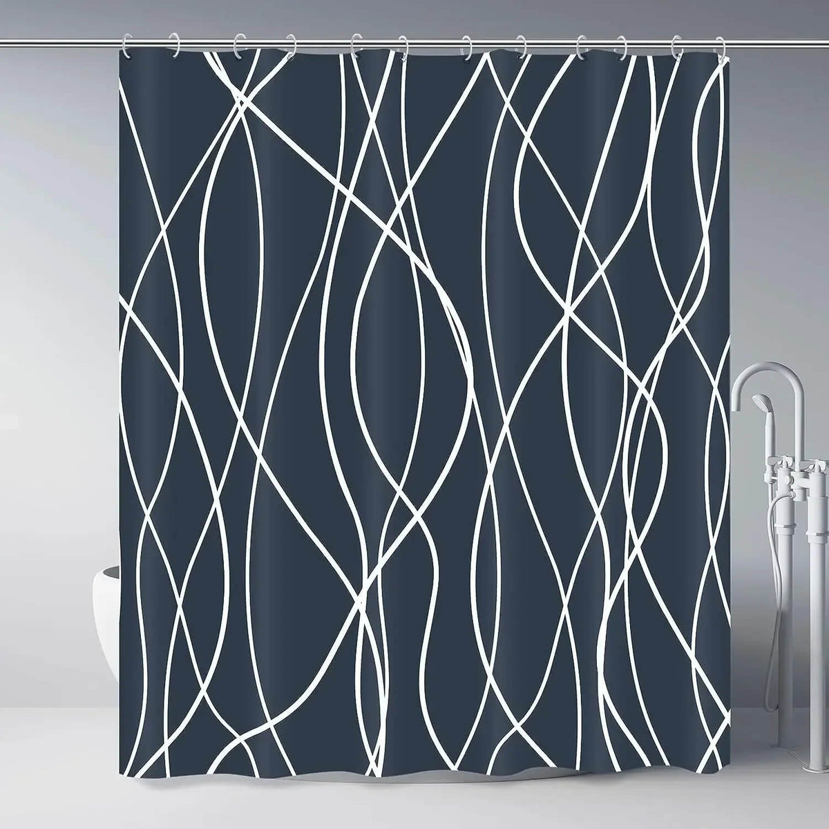A dark navy blue shower curtain with a white abstract wavy line pattern, hanging from silver rings on a metal rod in a bathroom setting.