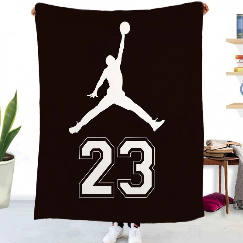 NBA themed throw blanket on sofa