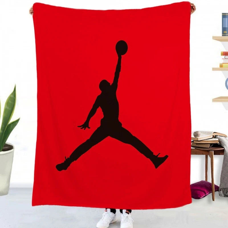 Ultra-soft NBA blanket folded on bed