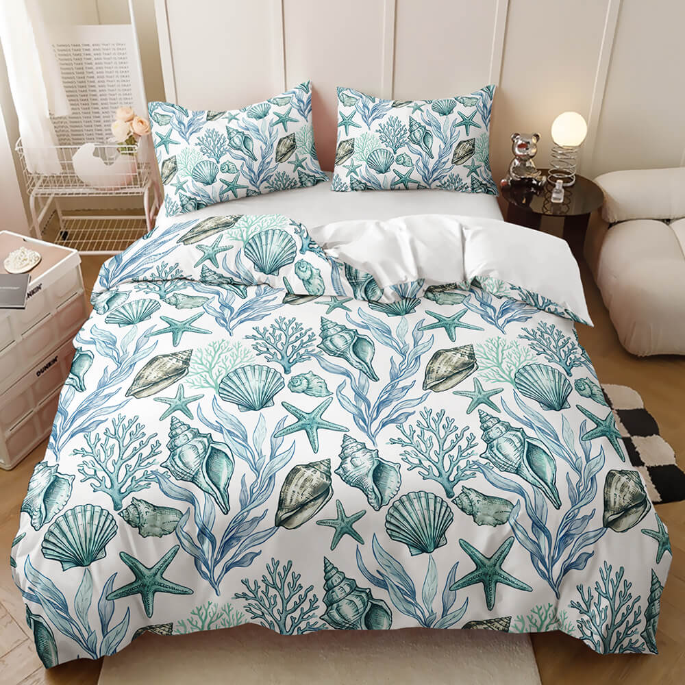 Sea life duvet cover set blue-green sea urchin and shell pattern, alongside matching throw pillows.
