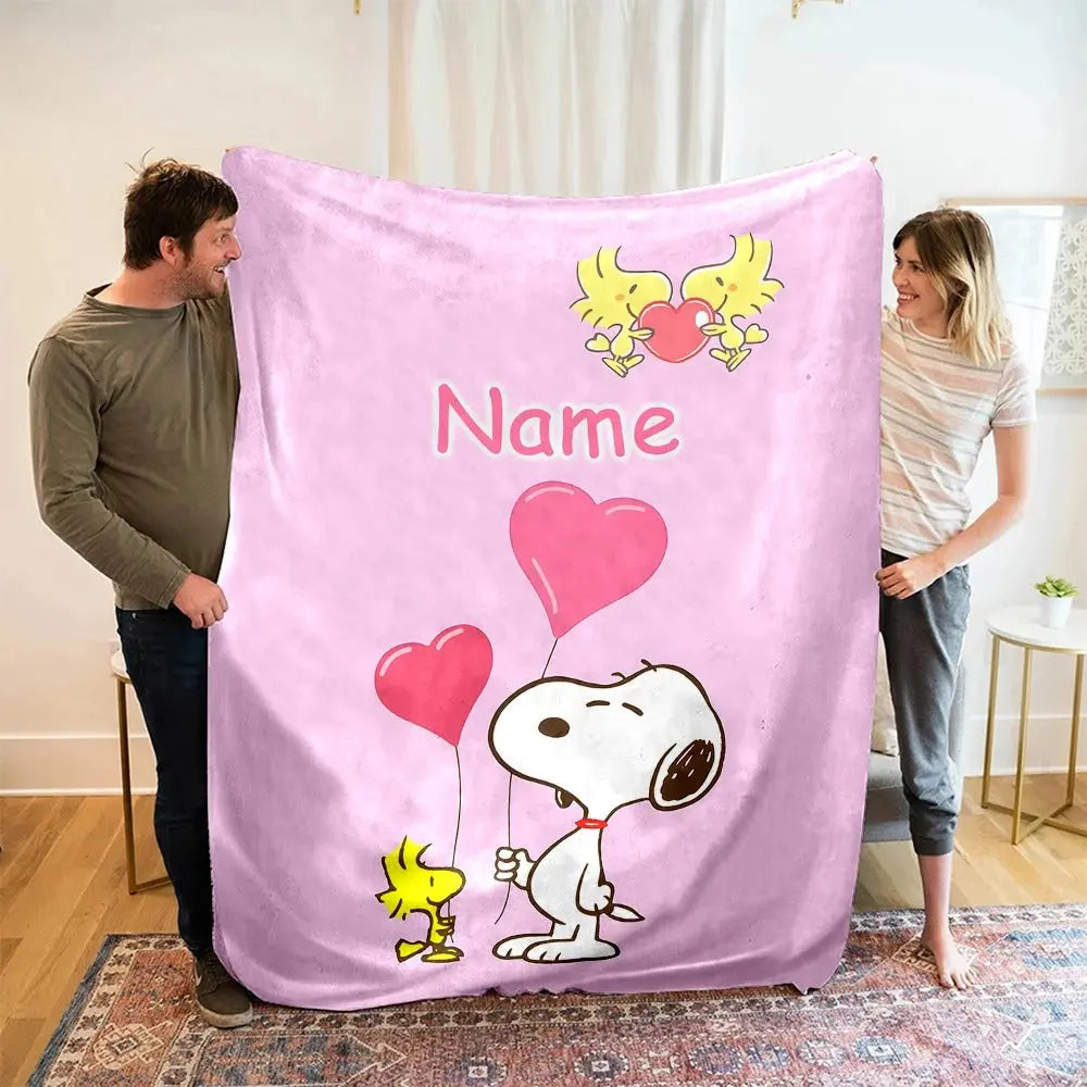 Cozy Snoopy Blanket with Custom Name on Couch or Sofa