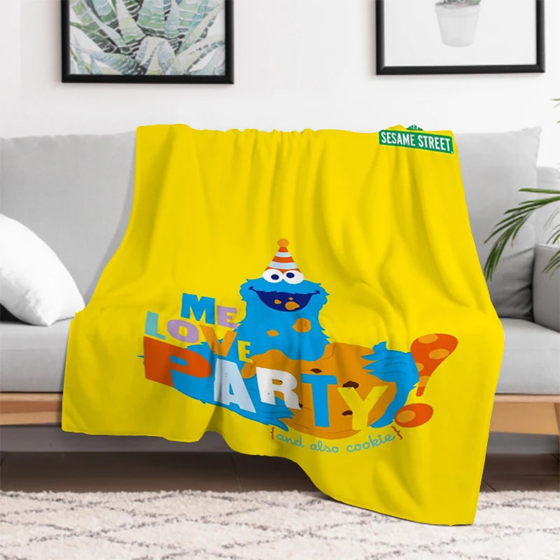 Sesame Street blanket displayed in nursery setting with kids toys