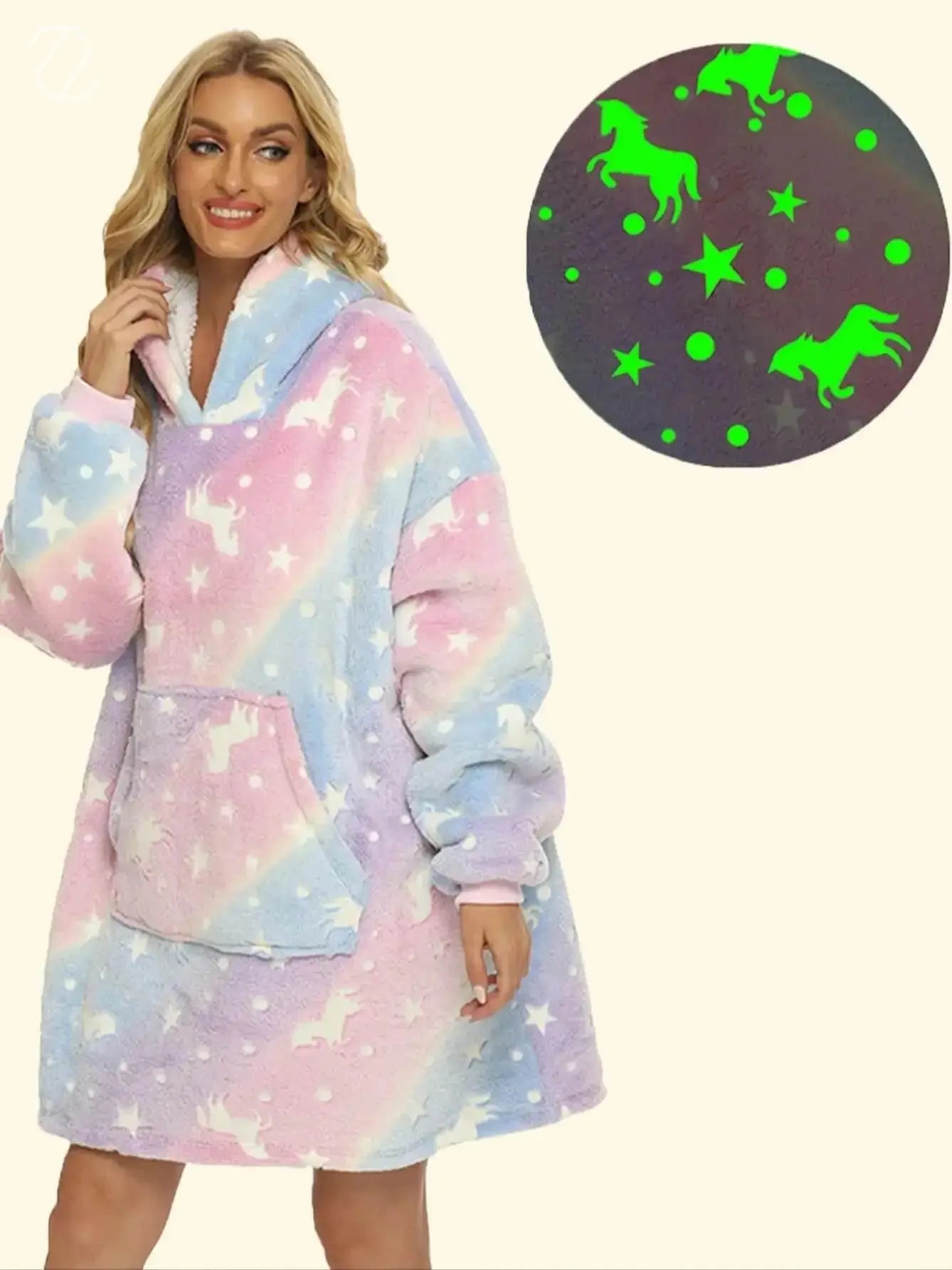 Teen girl lounging in unicorn glow blanket with hood and ears