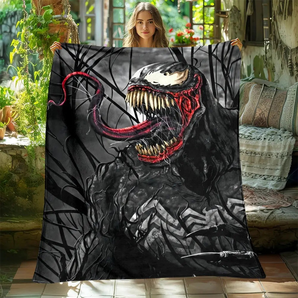 Venom printed flannel blanket folded on picnic mat