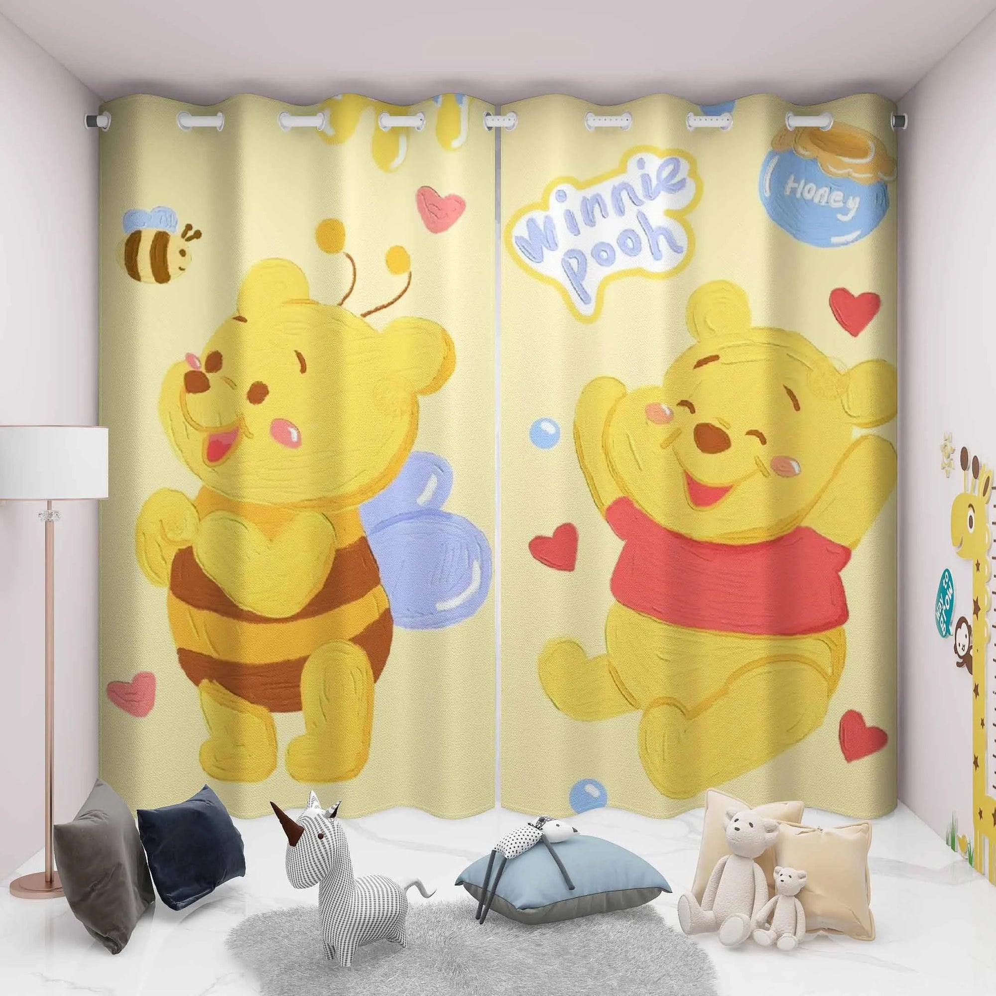 Curtains with Winnie the Pooh cartoon design in a children’s bedroom room décor.