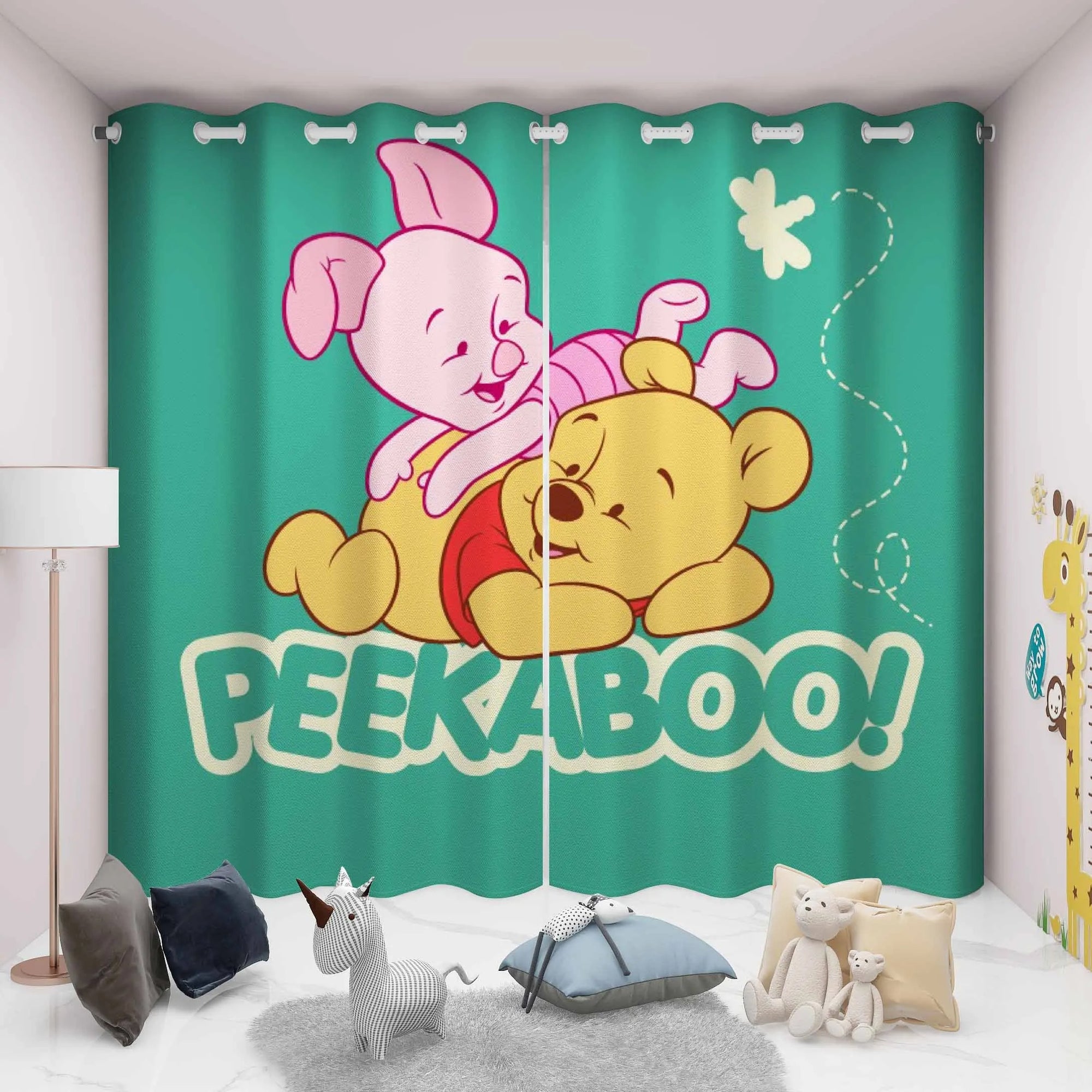 Winnie the Pooh cartoon curtains with characters and “PEEKABOO!” text in a playful kids bedroom room setting.